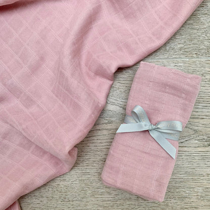 pink blush muslin cloth on wood